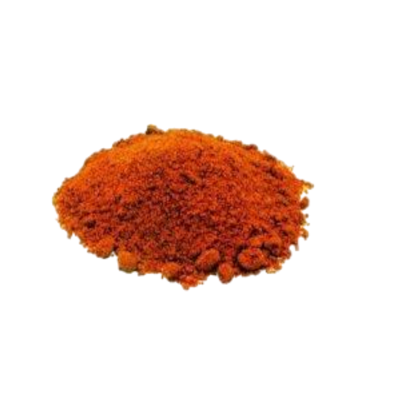A pile of a vibrant red chili powder