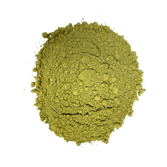 Japanese matcha green tea powder in a fine, vibrant green texture, perfect for tea ceremonies.