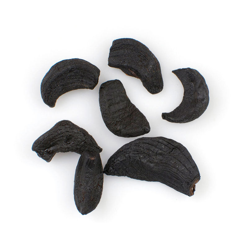 black garlic cloves peeled from skin