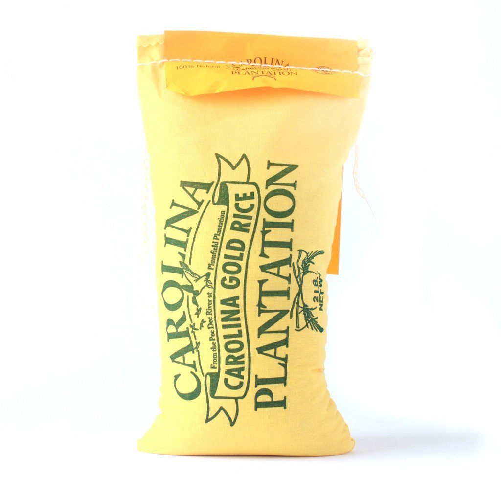 A bright yellow bag of carolina rice with green font