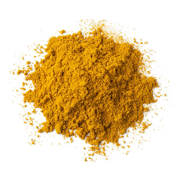 A pile of blended spices with a bright yellow hue