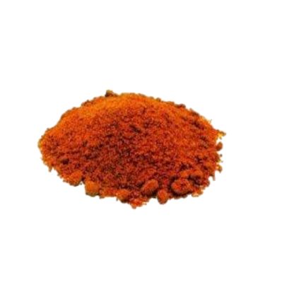 A pile of a vibrant red chili powder